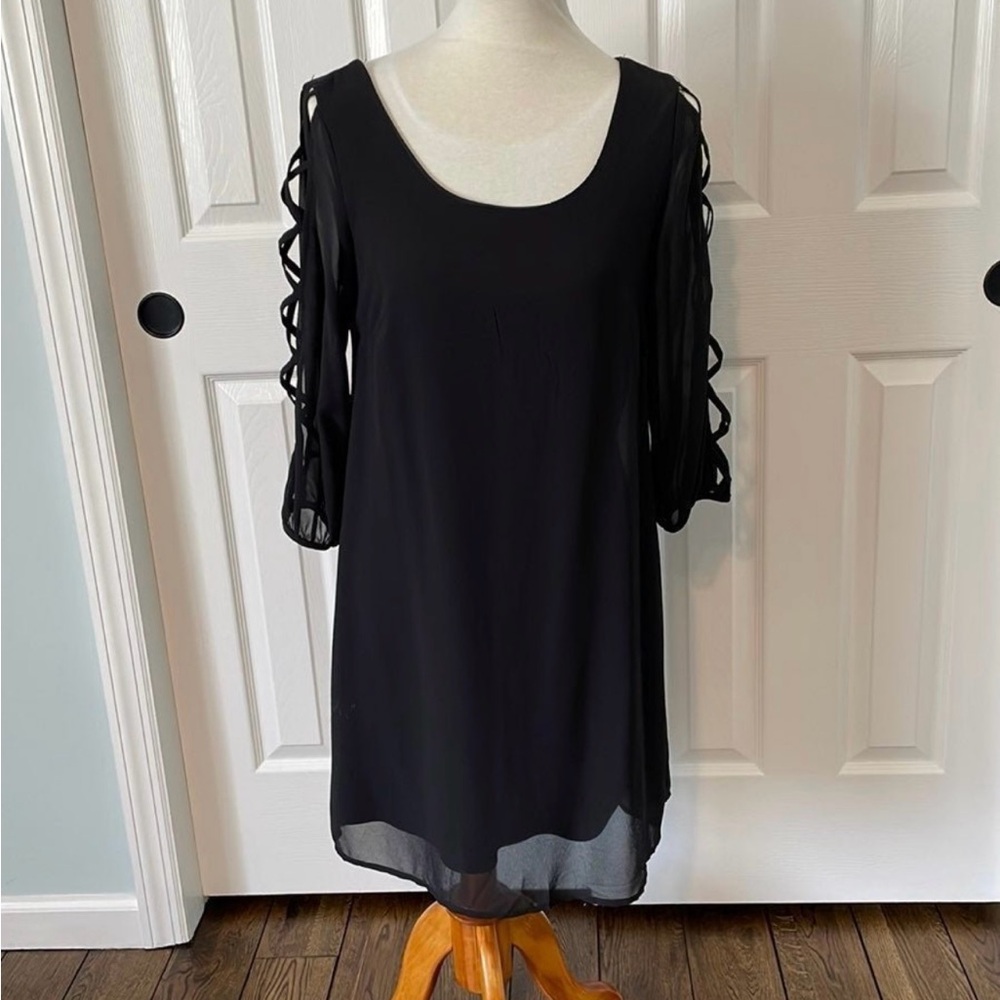 Elegant Black Dress with Cutout Sleeves